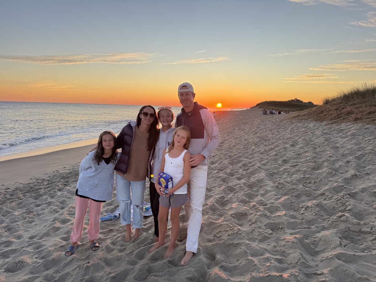 Graham Veysey with her family on Miacomet beach at sunset